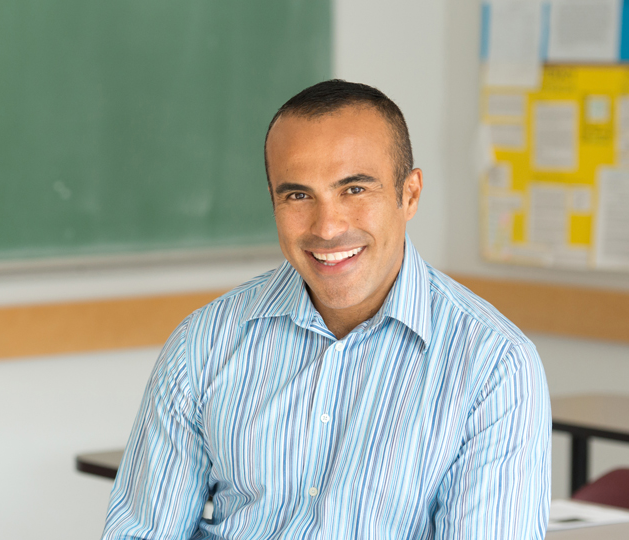Male teaching smiling.